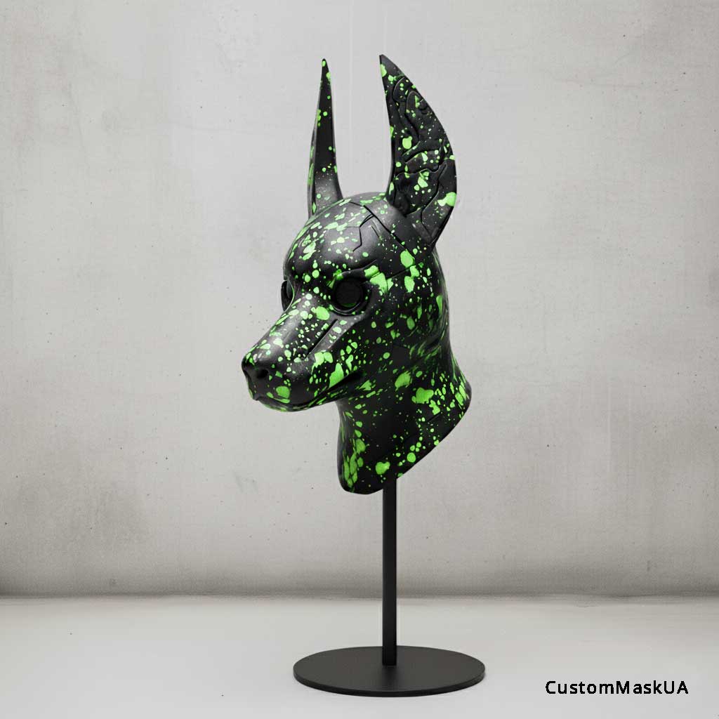custom black Anubis mask in Acid Glitch style with light green paint splashes from the CustomMask workshop